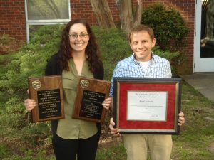 Jessica Kowalski holding the DeJarnette Scholarship and the Richard A. Krause Award and Paul Eubanks holding the A&S Outstanding Research by a Doctoral Student Award at Graduate Honor’s Day 4-4-16. 