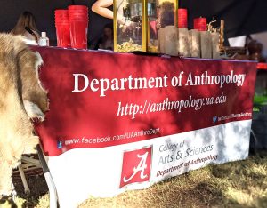 anthropology table at the homecoming tent on the Quad